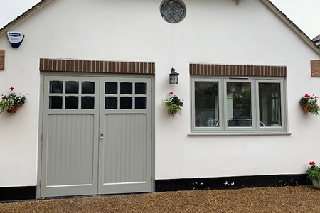 Timber side hinged garage doors with windows